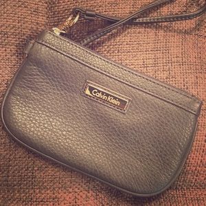 Grey leather Calvin Klein wristlet